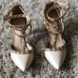 Pointy studded heels